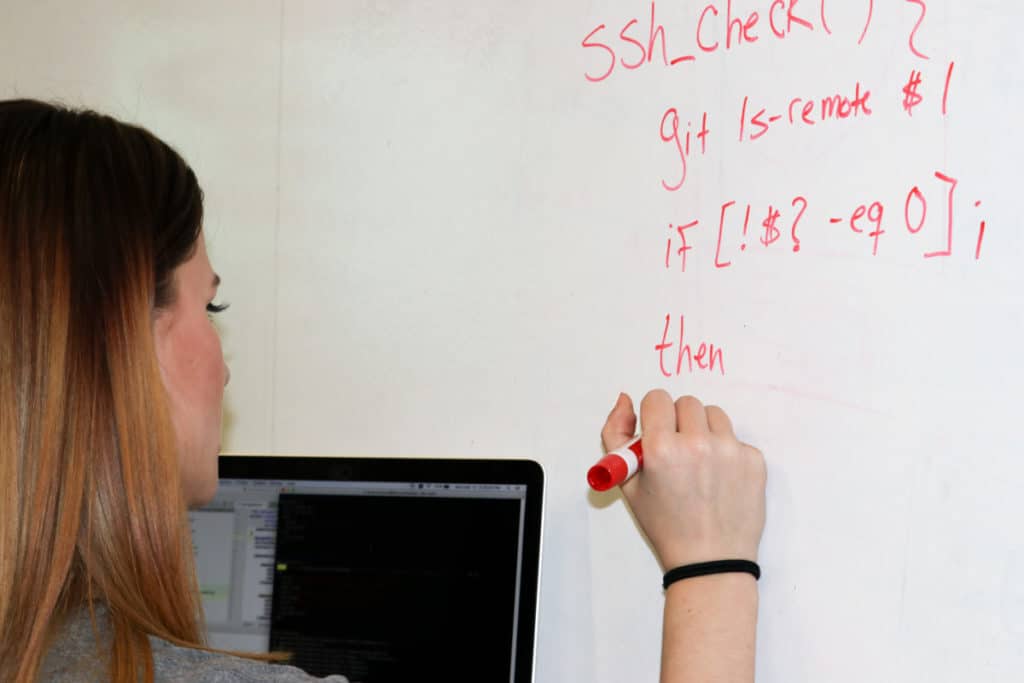 Lanna writing on whiteboard